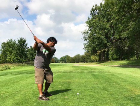 Shaun of Hometown Bicycles golfing at Kensington Metro Park